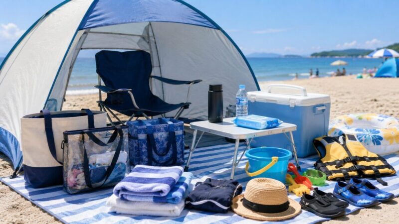 ビーチテントの日陰にチェアや飲み物を用意した海水浴の休憩スペース